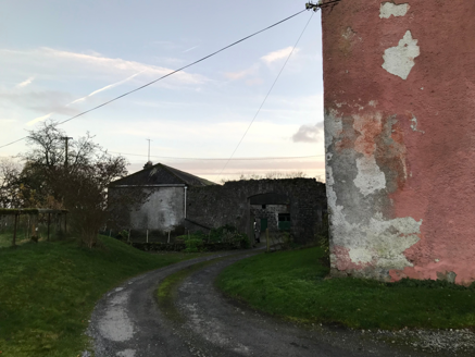 4: East side of house entrance to yard and stable buildings
