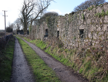 10:Lane, pre-1932, to south-east of property with remaining wall of old building to north side, possibly one of a pre-1840 clachan.