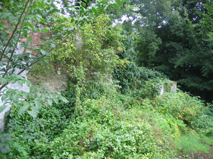 5:Stone and brick wall northwest of garden