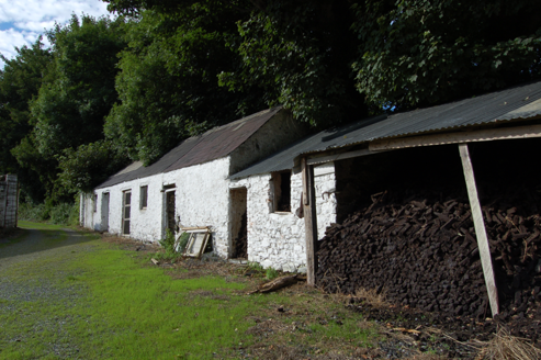 Outbuildings immediately north of house