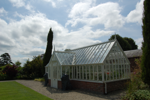 Ornamental glass house in walled garden